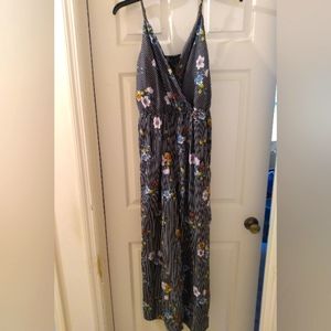 Fun & Flirt | Sleeveless Striped Floral Jumpsuit Large